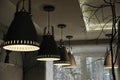 ceiling light lamps in evening cafe, night moody aesthetic, pendant lights, nordic style, simple design. Royalty Free Stock Photo