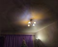 Ceiling luster and purple lavender curtain on Christmas night Royalty Free Stock Photo