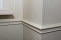 Ceiling moldings in the interior, detail of a angular wall skirting Royalty Free Stock Photo