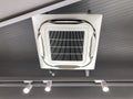 Ceiling mounted cassette type air conditioner Royalty Free Stock Photo