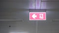 Ceiling Mounted Emergency Exit Sign with Left Arrow Direction Royalty Free Stock Photo