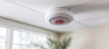 Ceiling-Mounted Smoke Detector Ensuring Safety and Security in a Modern Office Environment Royalty Free Stock Photo