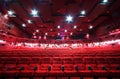 Ceiling and rows of chairs in cinema