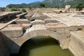 Ceiling ruins of ancient stone temple of Apollon in Klaros ancient city filled water