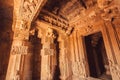 Ceiling and stone columns inside the traditional Hindu temple. Pattadakal, 7th century artworks of India.