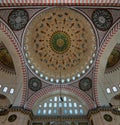 Ceiling of Suleymaniye Mosque with main dome and intersection of three arches, Istanbul, Turkey