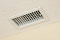 Ceiling vent on acoustic ceiling Royalty Free Stock Photo