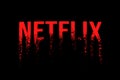 Celadna, Czechia - 04.21.2022: Approximation of Netflix logo dispersing into dust. Concept for shares plummeting