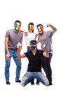 Celebrate atmosphere. Group of football fans support their national team: Belgium, Italy, Republic of Ireland, Sweden Royalty Free Stock Photo