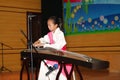 Celebrate Children's Day:playing guzheng Royalty Free Stock Photo