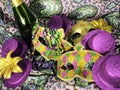 Celebrate Mardi gras, masks, beads, wine, purple gold green Royalty Free Stock Photo