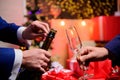 Celebrate new year with champagne. Last minute before new year. New year countdown. Hands opening champagne bottle and Royalty Free Stock Photo