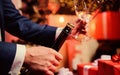 Celebrate new year with champagne. Toast and cheers concept. Lets celebrate. Male hands opening champagne bottle pouring