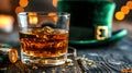 Generative AI. Close-up of whiskey-filled crystal glass on a dark surface, next to a festive green hat in soft focus.