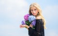 Celebrate spring with bouquet. Girl tender fashion model hold hydrangea flowers bouquet. Meet spring with fresh bouquet