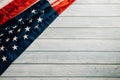 In honor of Veterans Day, American flags against a wooden backdrop Royalty Free Stock Photo