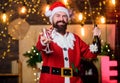 Celebrate winter holidays. Indulge yourself in joy. Man bearded santa celebrate christmas with alcohol drink. Celebrate Royalty Free Stock Photo