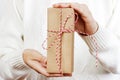 Celebrate year 2018. Woman hand holding gift box for Christmas and Happy new year 2018 background
