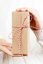 Celebrate year 2018. Woman hand holding gift box for Christmas and Happy new year 2018 background