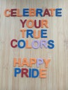Celebrate your true colors sign to celebrate pride month in june