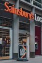 Celebrating Black History Month sign outside Sainsbury`s shop in Holborn, London, UK