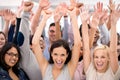 Celebrating business success. a group of smiling businesspeople raising their hands. Royalty Free Stock Photo