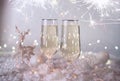Celebrating Christmas or New Year eve party with Bengal lights and champagne. Beautiful shiny place setting Royalty Free Stock Photo
