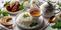 Celebrating eid al adha with traditional lamb, rice, tea, and festive decorations Royalty Free Stock Photo