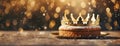 Celebrating Epiphany with cake against warm, sparkling lights.A regal gold crown rests on a traditional treat