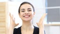 Celebrating Excited Woman in Office Royalty Free Stock Photo