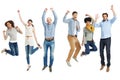 Celebrating the moment. Group of casually dressed young adults jumping excitedly against a white background. Royalty Free Stock Photo