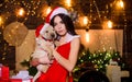 Celebrating New Year together. sensual girl in erotic lingerie. girl with cute puppy dog. happy new year. dog year Royalty Free Stock Photo