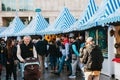 Berlin, October 03, 2017: Celebrating the Oktoberfest. People walk on the street market on the famous Alexanderplatz Royalty Free Stock Photo