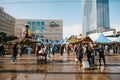 Berlin, October 03, 2017: Celebrating the Oktoberfest. People walk on the street market on the famous Alexanderplatz Royalty Free Stock Photo