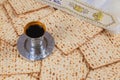 Celebrating passover jewish pesach attributes with kosher wine a matzah flatbread unleavened bread Royalty Free Stock Photo