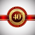 Celebrating 40th anniversary logo, with golden badge and red ribbon isolated on white background