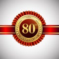 Celebrating 80th anniversary logo, with golden badge and red ribbon isolated on white background