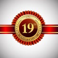 Celebrating 19th anniversary logo, with golden badge and red ribbon isolated on white background