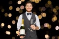 Man with bottle of champagne and glasses at party Royalty Free Stock Photo