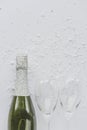 Celebration background: bottle of champagne and two empty glasses Royalty Free Stock Photo