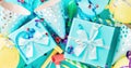 Celebration background with gift box colorful party streamers, confetti and birthday party hats top view Royalty Free Stock Photo