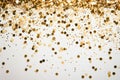 The celebration background of gold confettis is made up of a white background. Royalty Free Stock Photo
