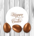 Celebration card with Easter chocolate eggs on wooden grey background