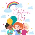 Celebration of children day with colorful rainbow with the blue clouds and three kids with green and yellow balloon Royalty Free Stock Photo