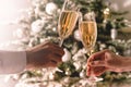 Celebration christmas and new year. Couple holding glasses of sparkling wine