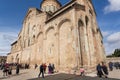 Celebration of City Day in crowd near the historical christian Svetitskhoveli Cathedral, UNESCO World Heritage Site.