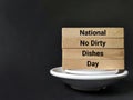 Celebration Concept - National no dirty dishes day text background. Stock photo.