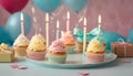 Celebration Cupcakes: Colorful cupcakes with lit candles displayed against a backdrop of wrapped gifts. Captured indoors