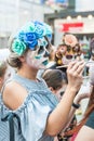 Celebration of the Day of the Dead. Girl with makeup doing face painting to another girl Royalty Free Stock Photo