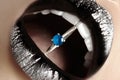 Celebration Fashion glossy Make-up. Wedding ring in Lips. Jewelry accessories. Christmas or Halloween glitter, Gift